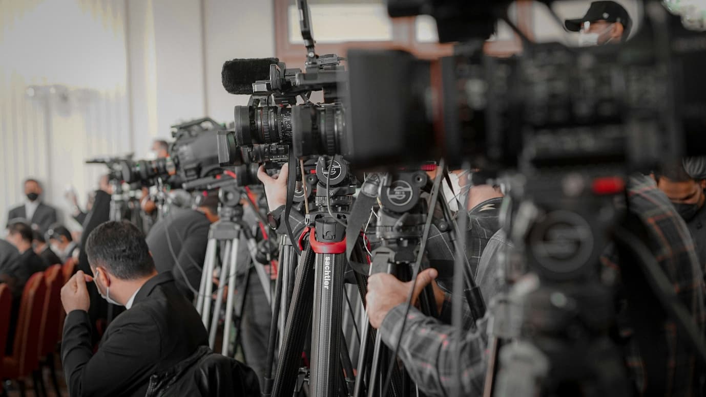 When Broadcasters Share Content: Cooperation or Competition?